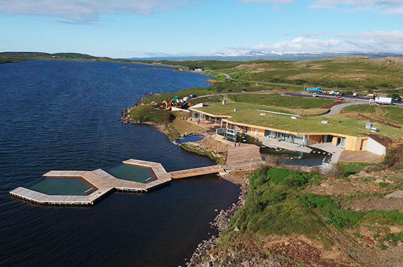 New geothermal bath featuring pools floating at lake shore in Iceland