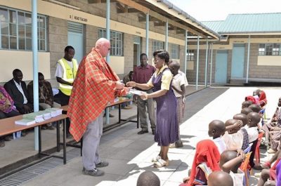 School ceremony with GEG staff and local Maasai school representatives, November 2014 (source: GEG)